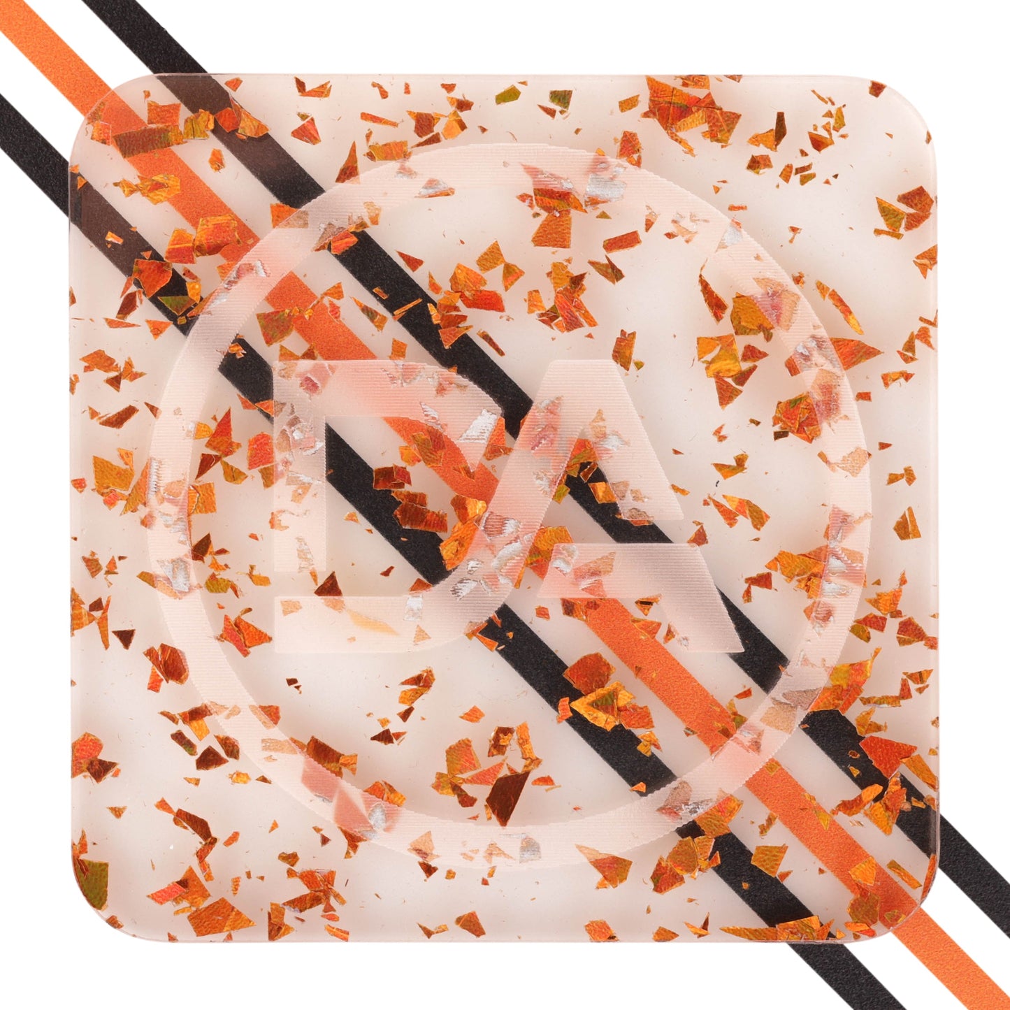 Clear acrylic with fiery orange foil shards embedded
